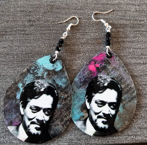 Raúl Juliá paper earrings.